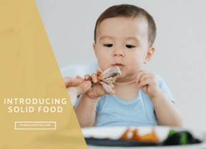 baby being introduced to solid food from about 5 to 6 months of age