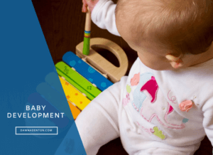 baby playing with a developmental toy
